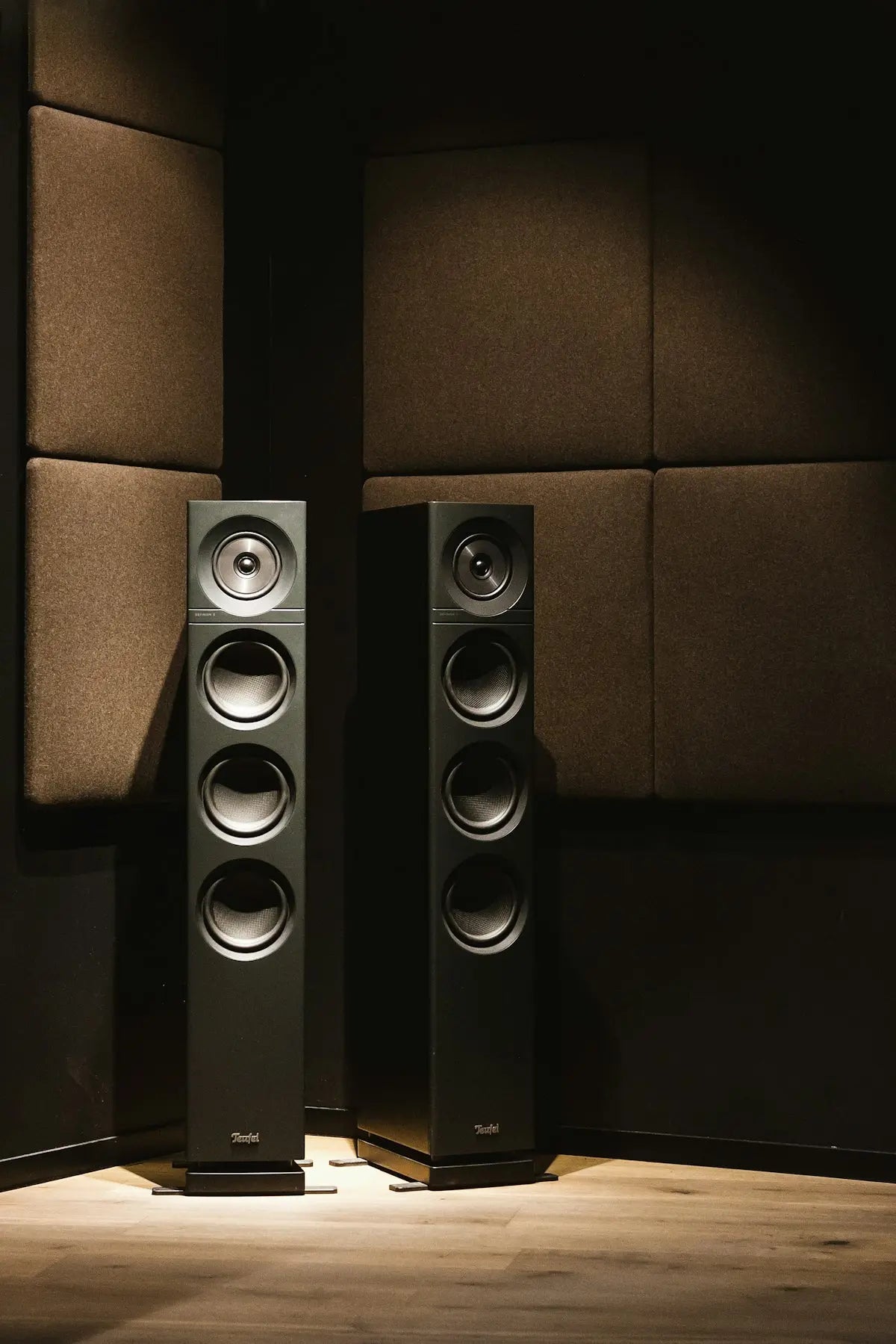 black and brown speaker on black surface