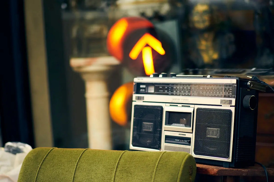a radio sitting on top of a green chair