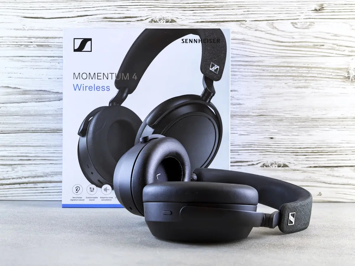 Sennheiser momentum 4 wireless headphones and box.
