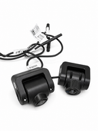 Pair of black dash cameras with mounting brackets and wiring harness