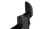 Black armrest console with open storage compartment and hinged cover
