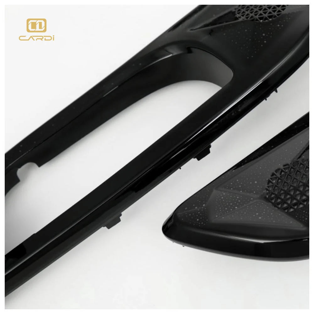 Black LED ambient light trim close-up with textured mesh and curved cutout
