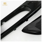 Black LED ambient light trim close-up with textured mesh and curved cutout