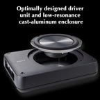 Active under-seat subwoofer with circular driver in gray cast-aluminum enclosure